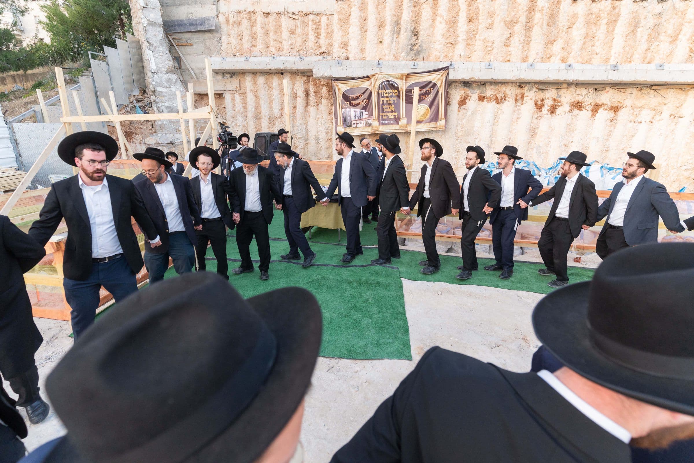 Members of the kehila dancing at the cornerstone laying